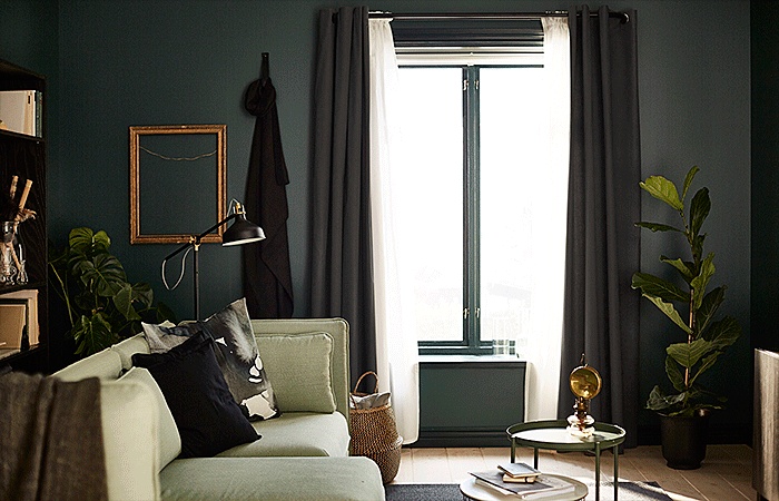 A GIF shows the difference between a sheer curtain and a very thick curtain.