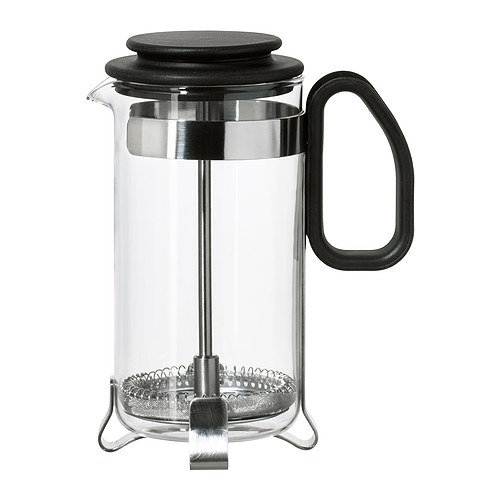 A glass coffee/tea maker against a white background.