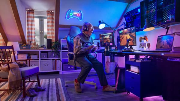 A grandpa gaming with his IKEA furniture gaming set up.