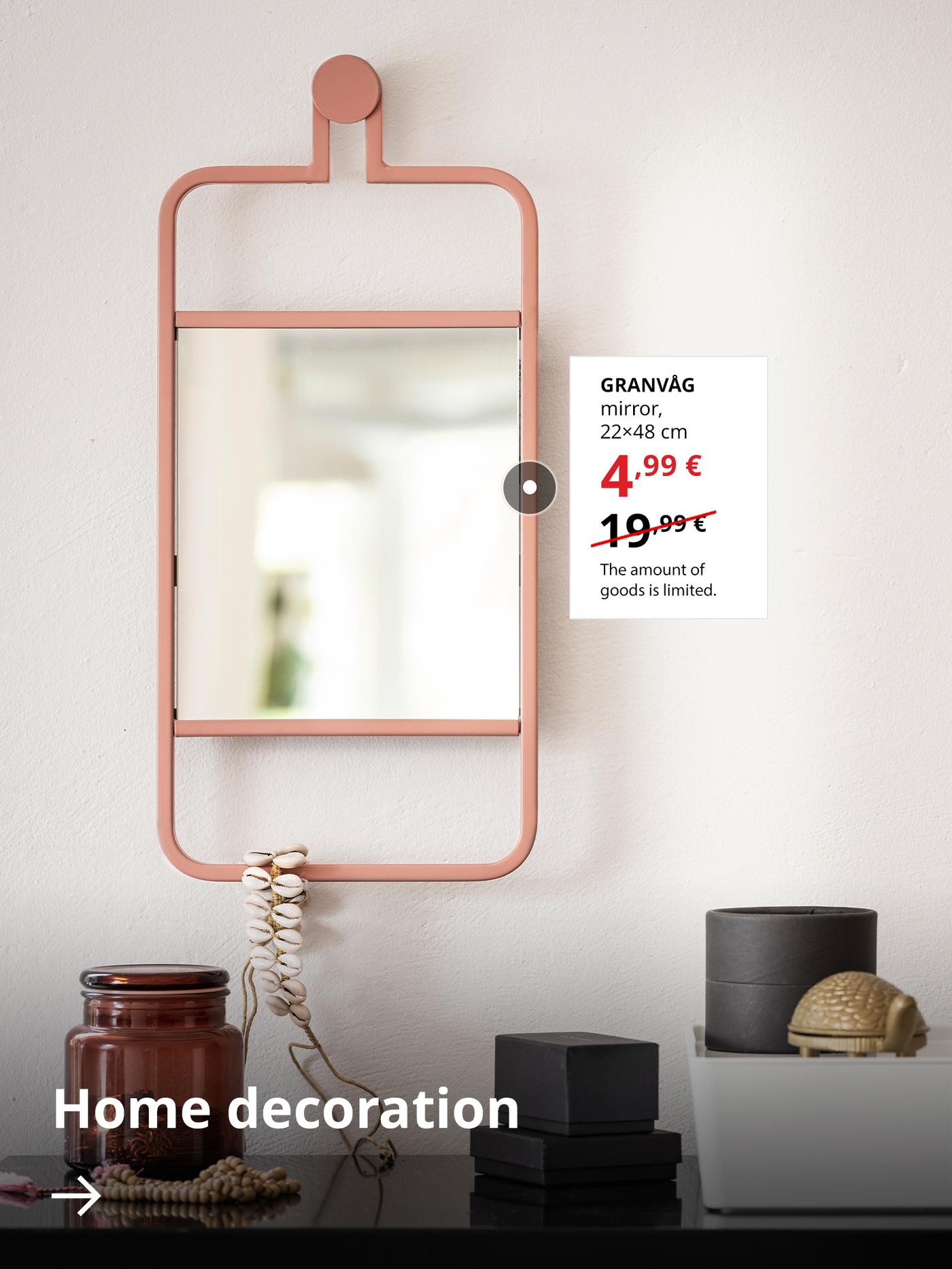 A GRANVÅG mirror hangs on the wall. Next to it, on a white background, its sale price is shown — 4,99 € (regular price 19,99 €). Below, there is an arrow with the text “Home decoration”.