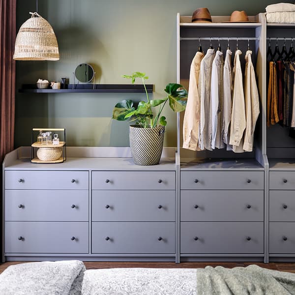 A gray HAUGA chest of three drawers.