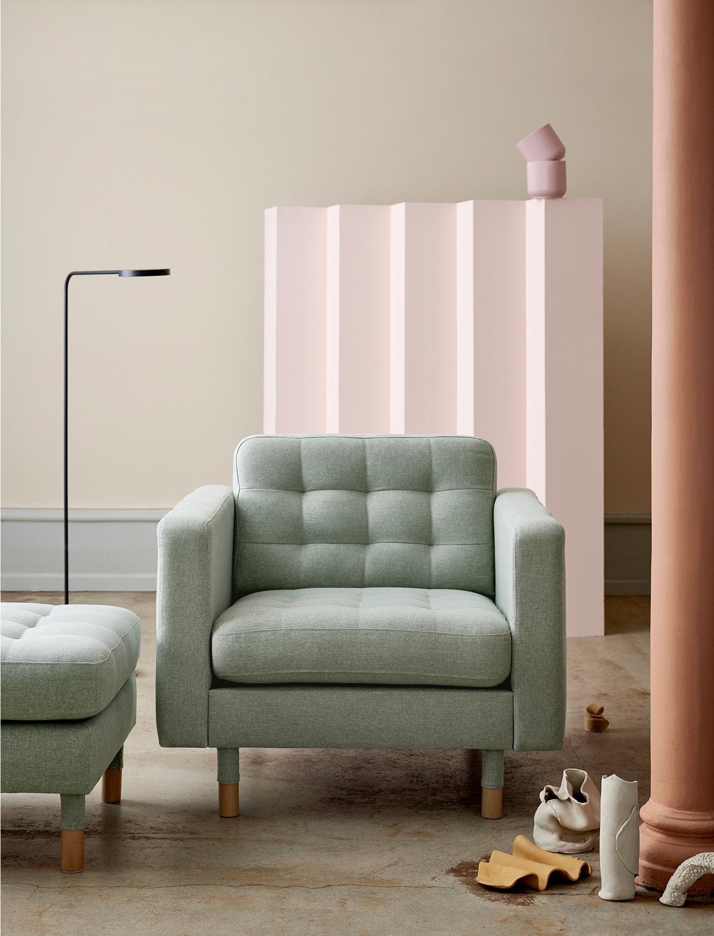 A green 1-seat couch 