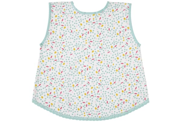 A green and white patterned child’s apron.