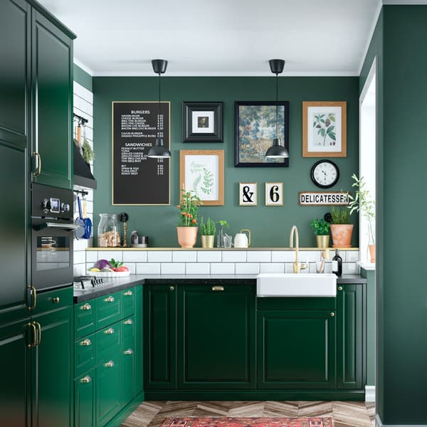 A green BODBYN  kitchen in a corner