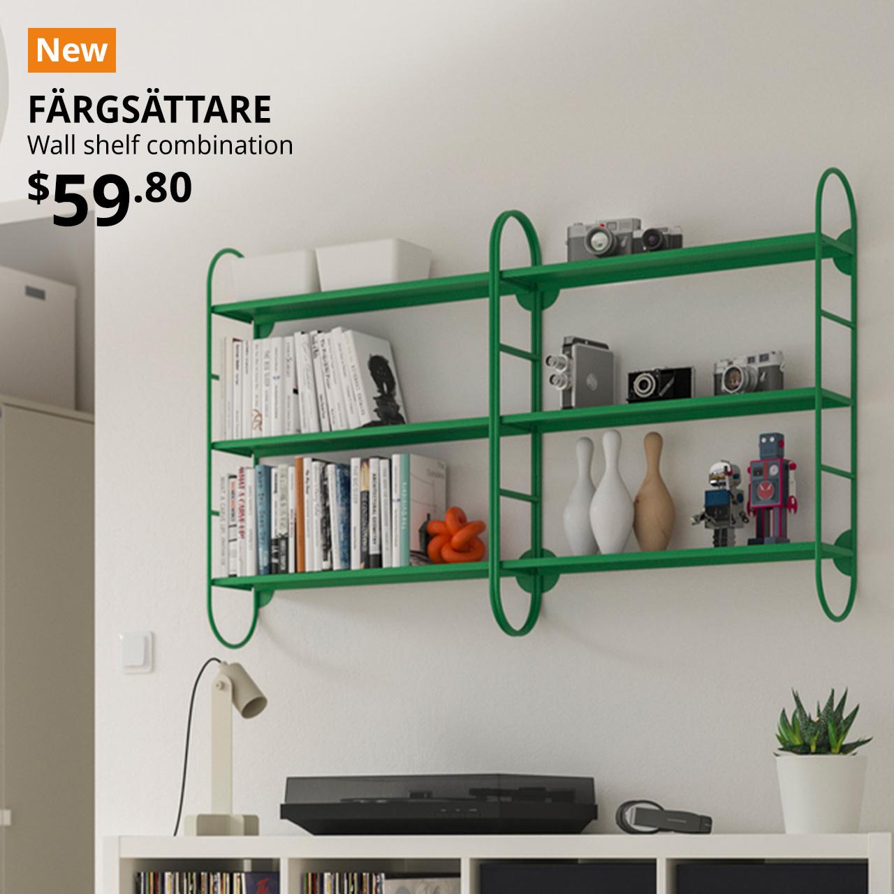 A green FÄRGSÄTTARE wall shelf combination is mounted on top of a white KALLAX shelving unit with vinyl record player displayed. An orange "NEW" label is on the top left of the image with black text that reads: FÄRGSÄTTARE, Wall shelf combination, Price is $59.80