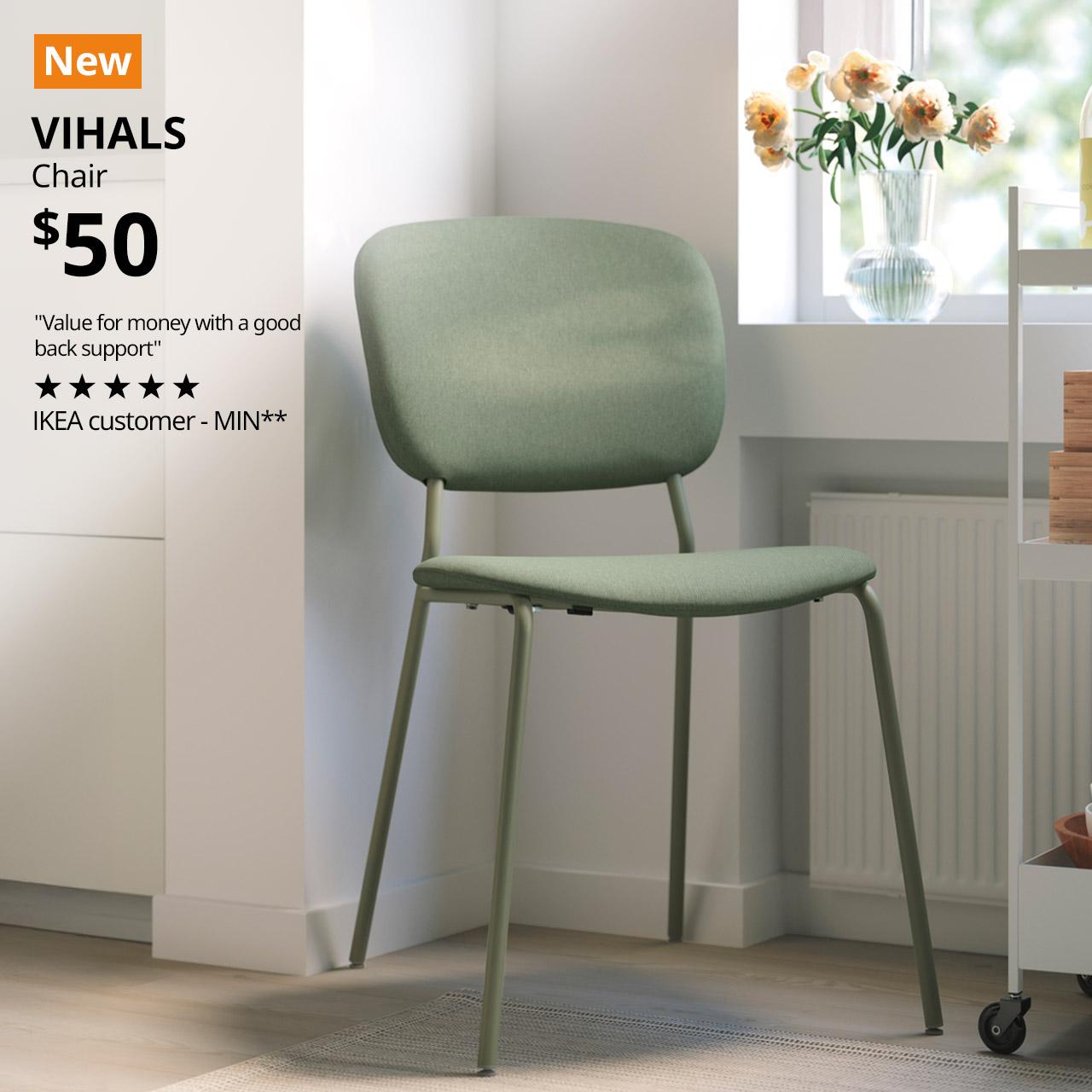 A green VIHALS chair is placed in the corner of a room. A orange with white 'New' tag on the top left corner of the image. Followed by black text over image that reads "VIHALS, Chair, Price at $50. "Value for money with a good back support" - reviewed by IKEA Customer MIN**"