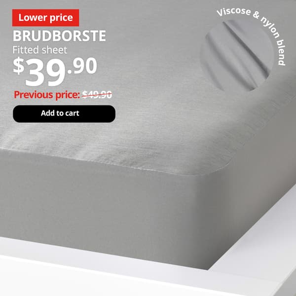 A grey BRUDBORSTE fiitted sheet in 150x200 cm. On top right corner, product benefit is highlighted, a image of BRUDBORSTE viscose & nylon blend. Text on image reads, BRUDBORSTE , Fitted sheet. Price at $39.90, Previous price $49.90.