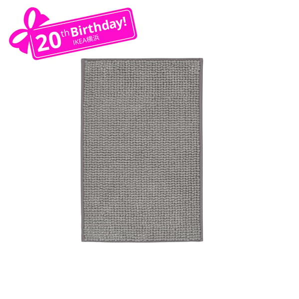 A grey-white/mélange TOFTBO bath mat in the NA