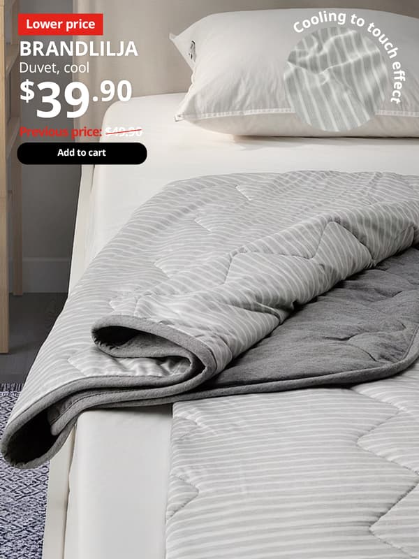 A grey with white stripe BRANDLILJA cool duvet on a vissle beige TÄRNKULLEN bed with a pillow. On top right corner, product benefit is highlighted, a image of BRANDLILJA cooling to touch effect. Text on image reads, BRANDLILJA , Duvet, 200x200 cm. Price at $39.90, Previous price $49.90.