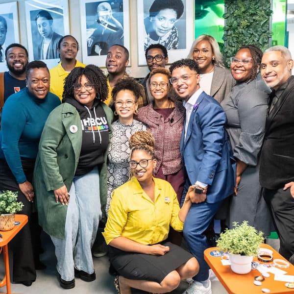 A group of people smiling.