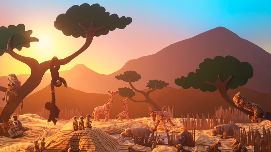 A group of various wild animals, including giraffes, monkeys, meerkats, and a leopard, gather on a savanna landscape at sunset with trees and mountains in the background.