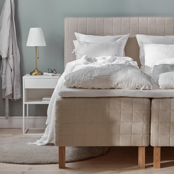 A guide with tips about wooden-base spring mattress beds to help you choose the best bed for you.