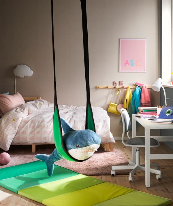 A GUNGGUNG swing beside your child’s desk makes the switch between activity and work flow quick and effortless.