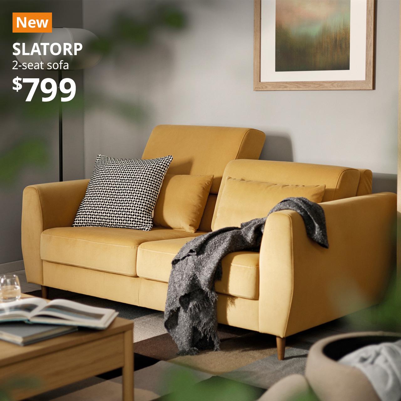 A hakebo yellow-brown SLATORP 2-seat sofa in a living room seating. An orange "NEW" label is on the top left of the image with white text that reads: SLATORP, 2-seat sofa, $799.