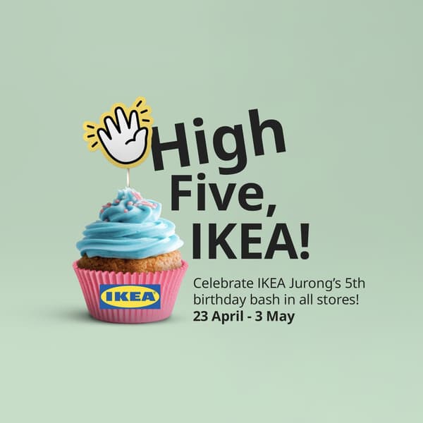 A hand doing a high five action is placed on a cupcake in a cupcake holder with the IKEA logo. Black text reads: High Five, IKEA! Celebrate IKEA Jurong's 5th birthday bash in all stores! 23 April 