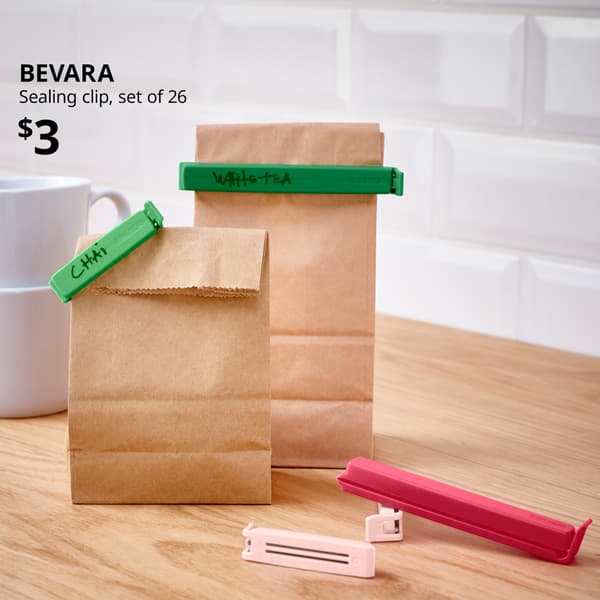 A handful of BEVARA sealing clip on the kitchen countertop. Black text on top left of the image reads: BEVARA, Sealing clip, set of 26. Price: $3.