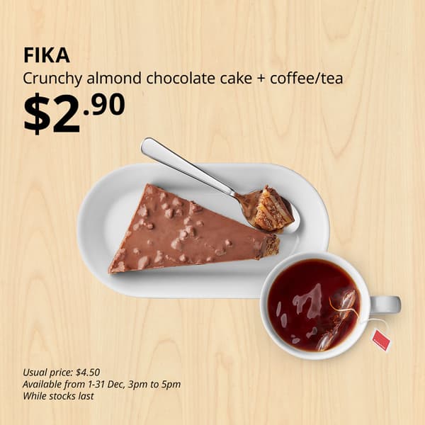 A image of Crunchy almond chocolate cake and a cup of tea. Black text over image that reads 