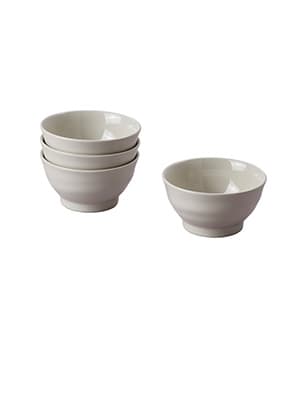 A image of SANDSKÄDDA light grey-beige bowl being stacked together.