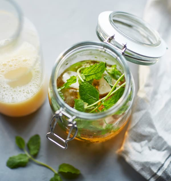 A jar filled with virgin Moscow mule is shot from above.