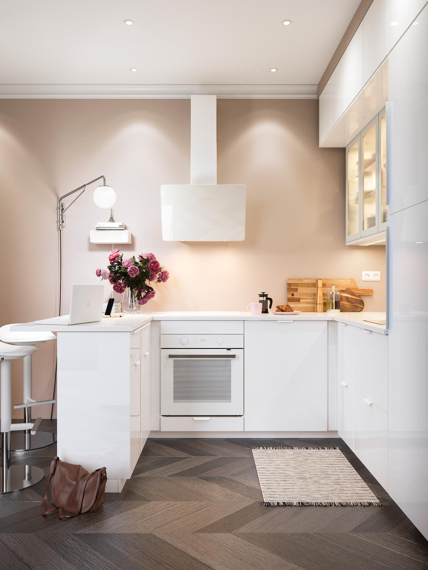 A kitchen with an extractor hood,