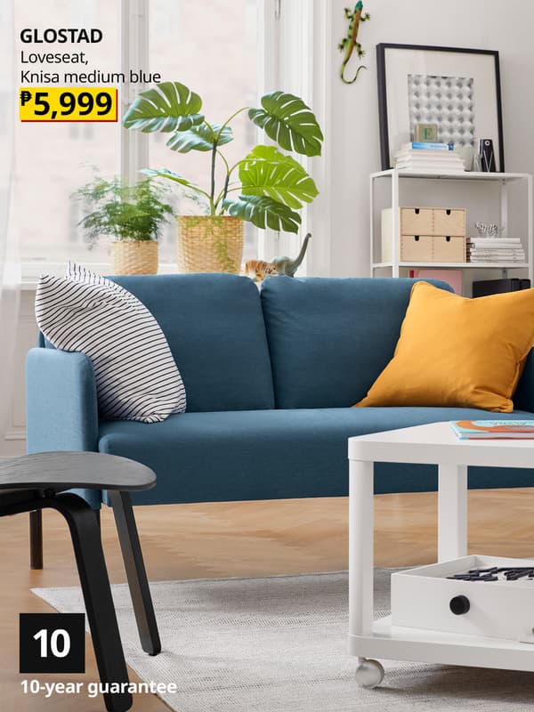 A Knisa medium blue GLOSTAD 2-seat sofa