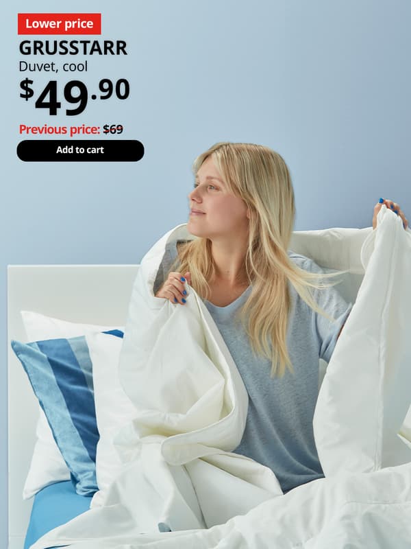 A lady wrapping herself up with a white GRUSSTARR duvet in a bedroom setting. On top right corner, product benefit is highlighted, a image of GRUSSTARR lyocell & cotton blend. Text on image reads, GRUSSTARR, Duvet, cool. Price at $49.90. Previous price $69.