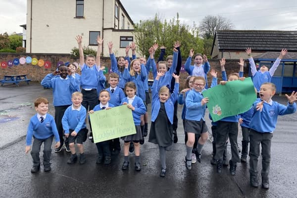 A large group of students from Lochfield Primary School in Paisley 