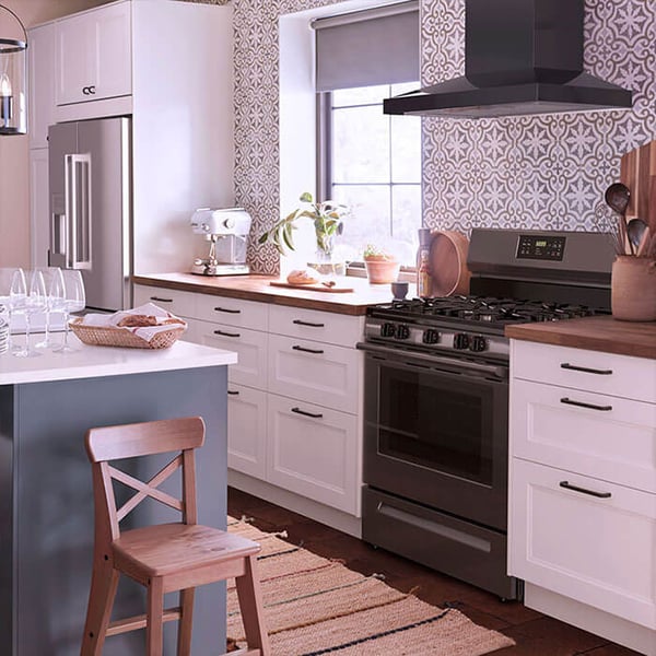 A large kitchen featuring stainless steel appliances.