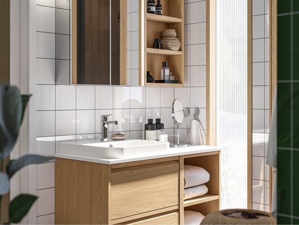 A LETTAN mirror cabinet with doors and a HAGAÅN wall open cabinet above an ÄNGSJÖN/BACKSJÖN wash-stand/wash-basin/tap.