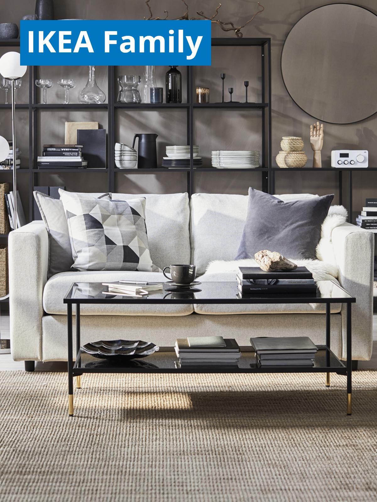 A lifestyle image of a gunnared beige VIMLE 2-seat sofa in a living room setting. On the top left corner, a blue tag with white text that reads "IKEA Family price".