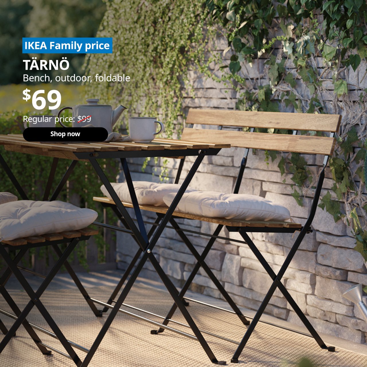 A light brown stained TÄRNÖ bench at the balcony. On the top left corner, a blue tag with white text that reads "IKEA Family price", followed by white text overlaying the image that reads "TÄRNÖ, Bench, outdoor, foldable, $69, Regular price $99"