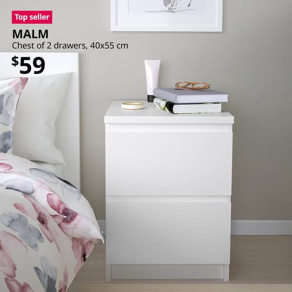 A MALM chest of 2 drawers in white placed at the side of a queen sized MALM bed. A red "Top seller" label is on the top left of image, with black text below that reads: MALM, chest of 2 drawer, 40x55 cm. $59