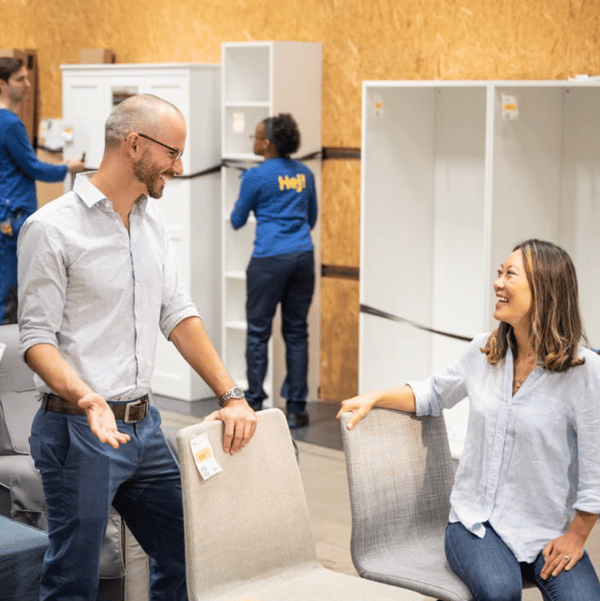 A man and women shopping buy back in store