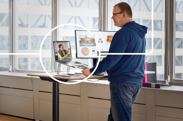 A man is on a video call with the IKEA design team.