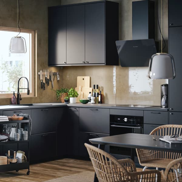 A matte black KUNGSBACKA kitchen in a corner