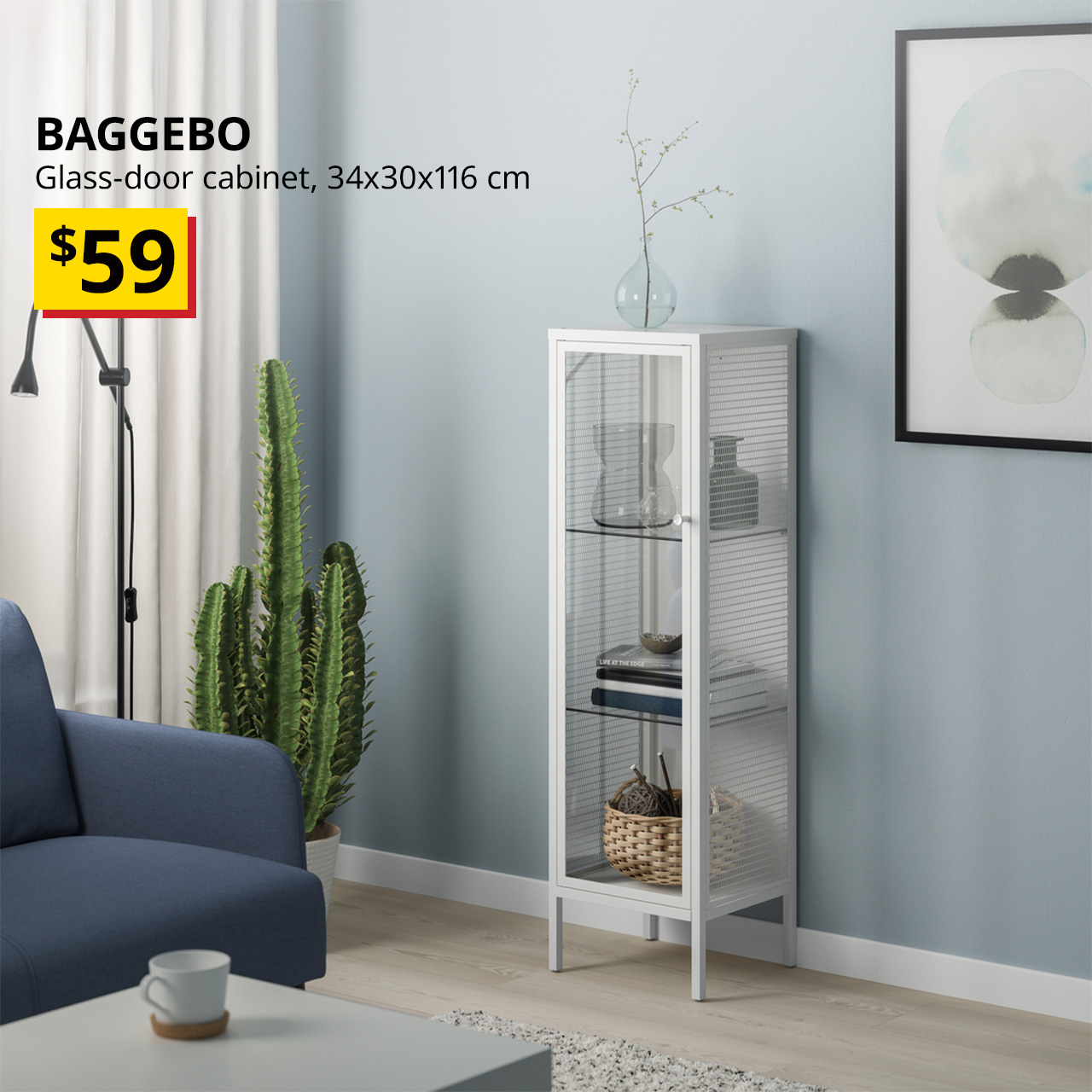 A metal white BAGGEBO glass-door cabinet in a living room setting next to a sofa with decorations displayed on each shelving. Black text overlay image on the left that reads , "BAGGEBO, Glass-door cabinet, 34x30x116 cm" with BTI Price: $59.