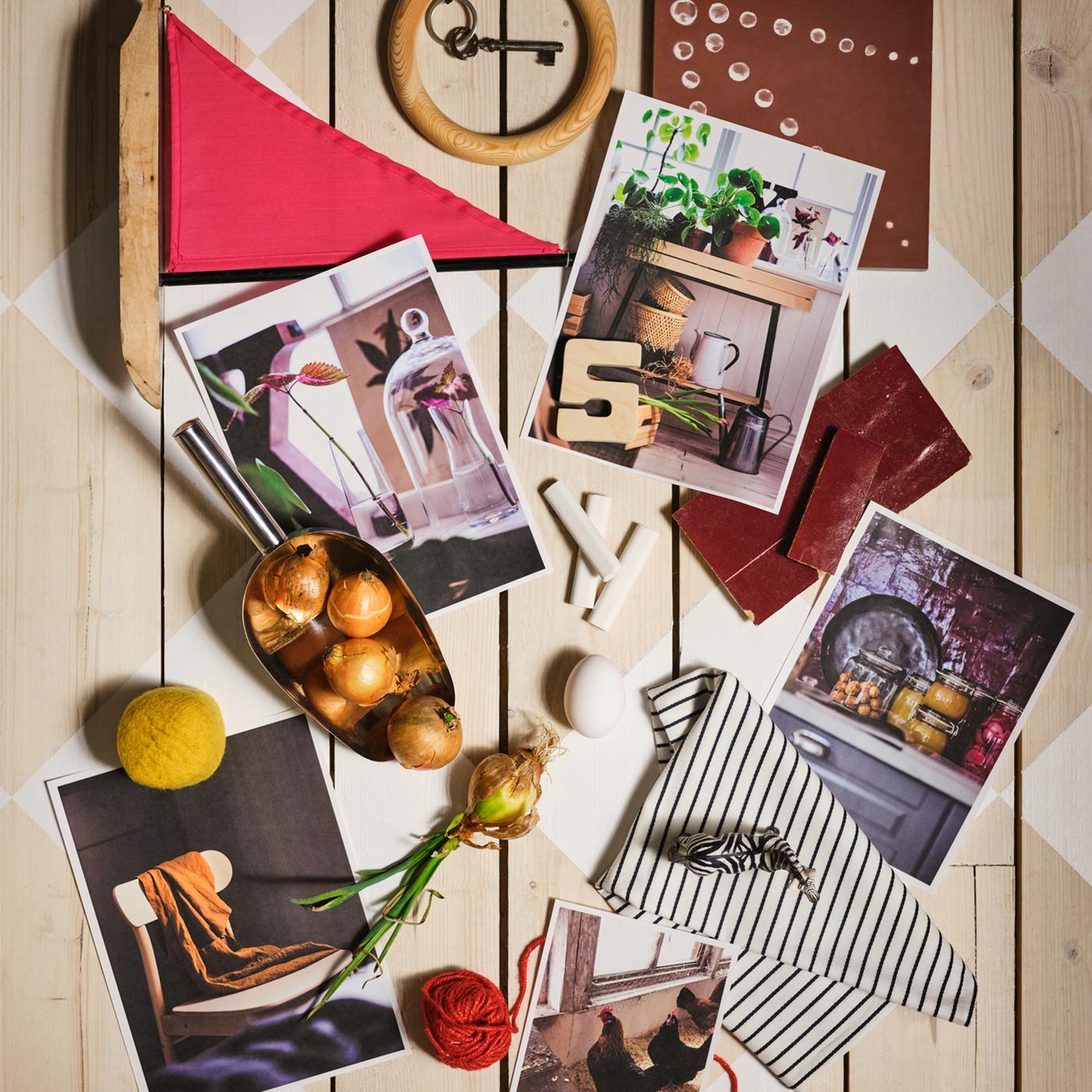 A mood board with onions, red yarn, a white striped tea towel and a photograph of a FRÖSET easy chair.