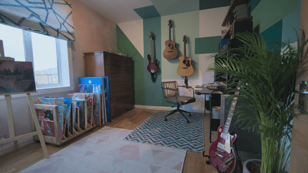 A new creative studio for their art and music with shelving storage, to create a workspace