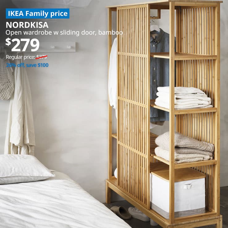 A NORDKISA sliding door bamboo wardrobe in the bedroom