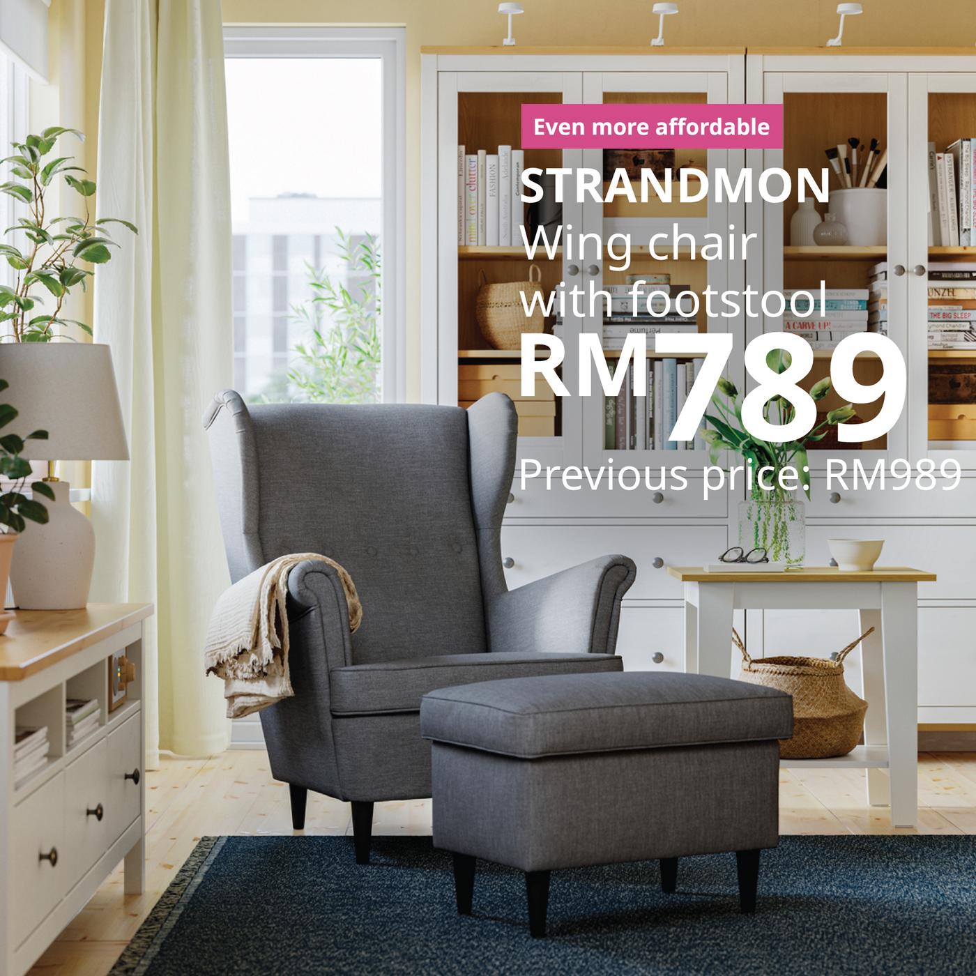 A Nordvalla dark grey STRANDMON footstool in the living room