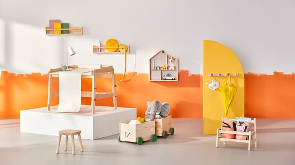 A orange/white room full of products from FLISAT series.