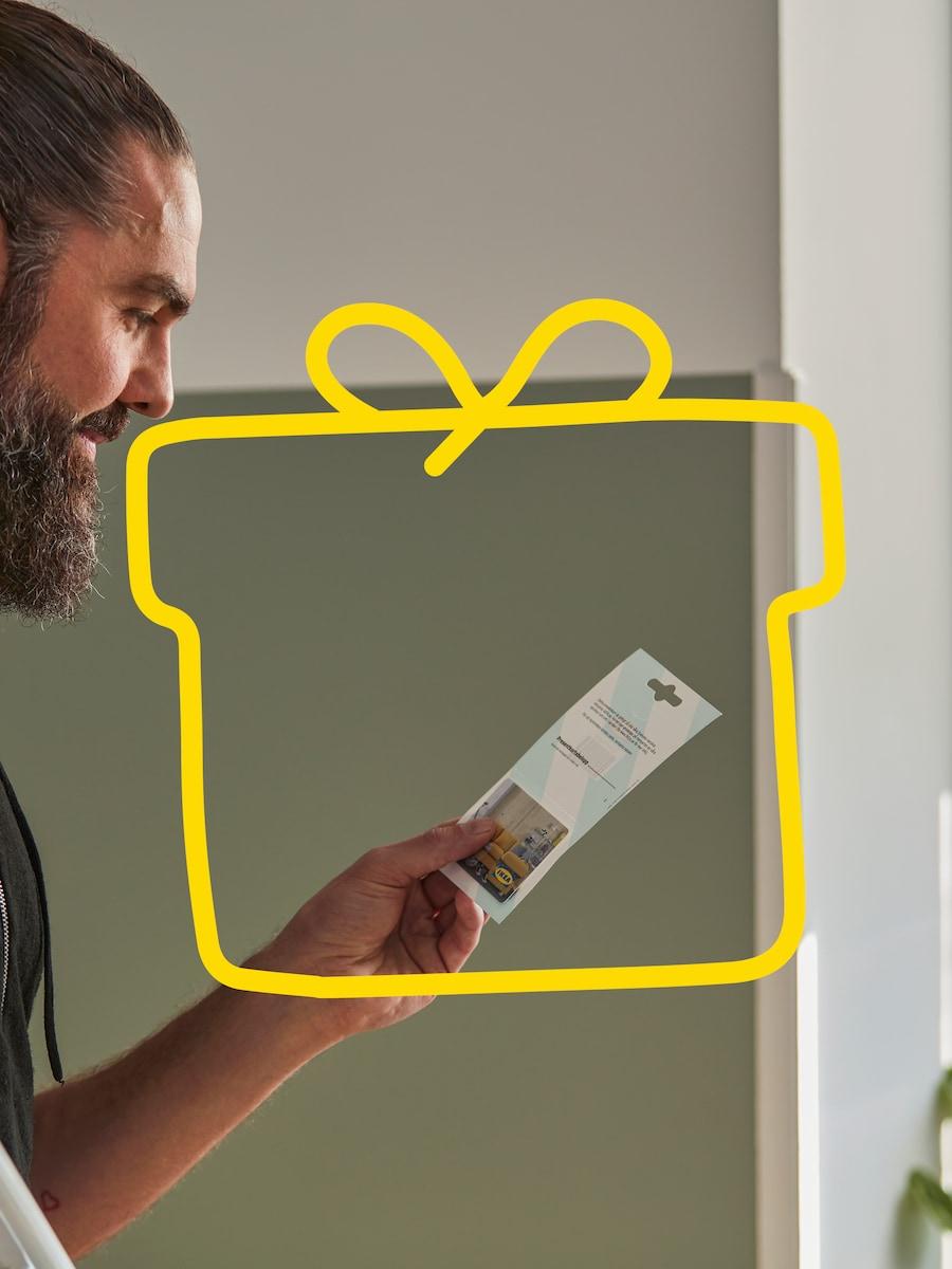 A person is holding a discount coupon in their hand.