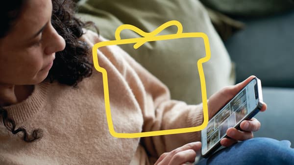 A person is looking at a smartphone