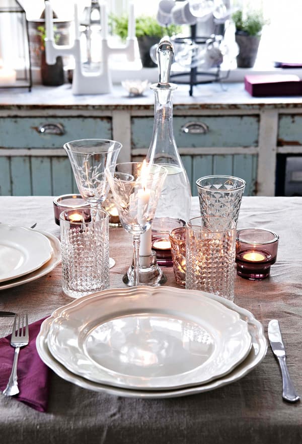 A place setting that blends inherited family china with newly bought items to create a unique dining experience.
