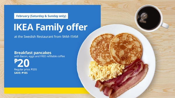 A plate with two pancakes, scrambled eggs, and two slices of bacon next to a cup of coffee, advertising an IKEA family breakfast offer for ₱20 available on weekends.
