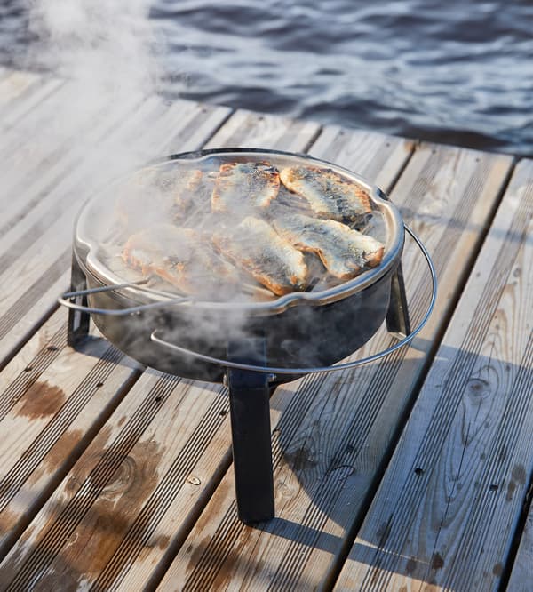A portable charcoal barbeque.