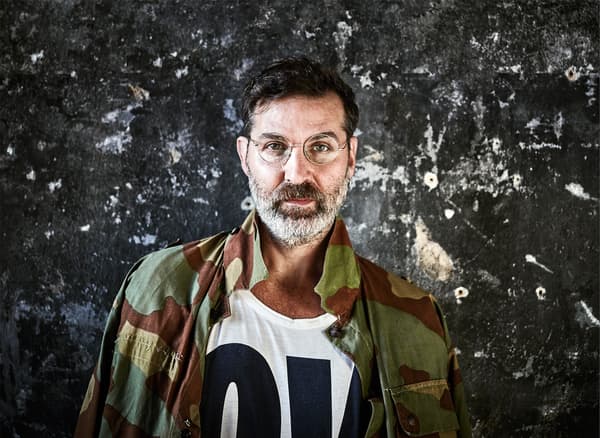 A portrait of a man who works as an interior stylist.