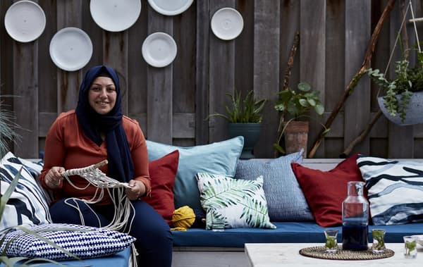 A portrait of Aysu in her courtyard.