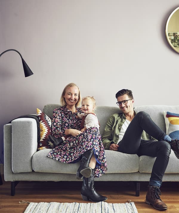 A portrait of Marrit, Jelmer and Mia on their sofa.