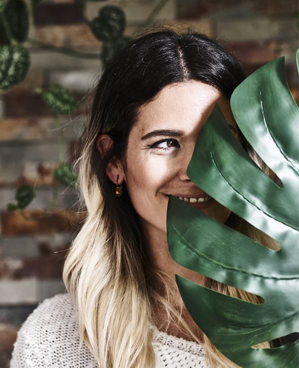 A portrait of Miriam and a large leaf.